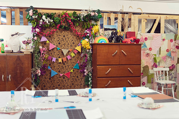 Inside The Papery creative studio decorated with colourful papers and artwork.