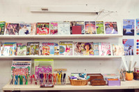 Paper shelves and supplies ready for collage workshops in Port Macquarie.