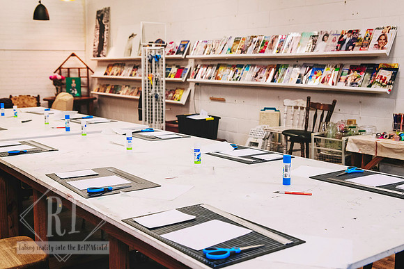 Workshop tables ready for participants at The Papery.