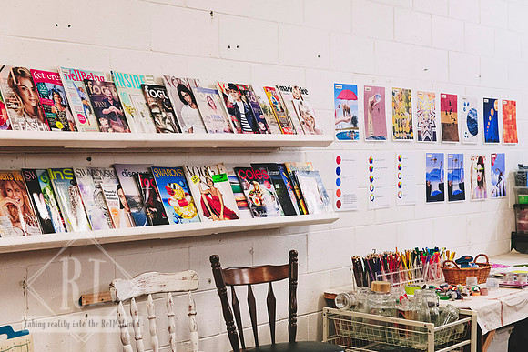 Paper shelves and creative supplies inside The Papery.
