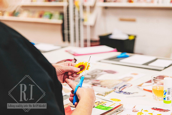 Collage making in progress during a creative workshop.