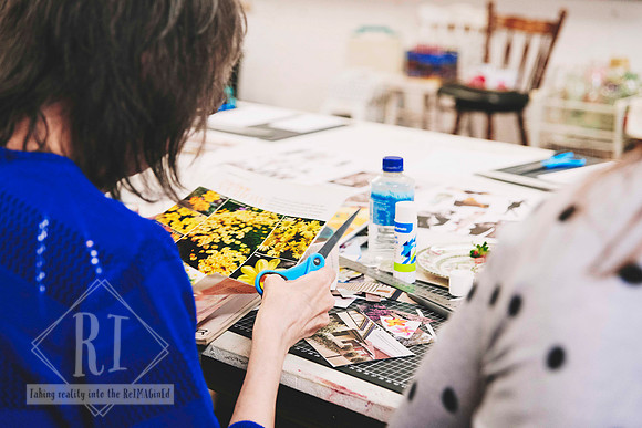 Creative paper collage workshop in progress.