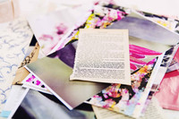 Decorative papers and book pages used in a beginner journal binding class.
