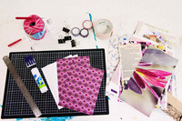 Paper supplies and tools arranged for a handmade journal workshop in Port Macquarie.