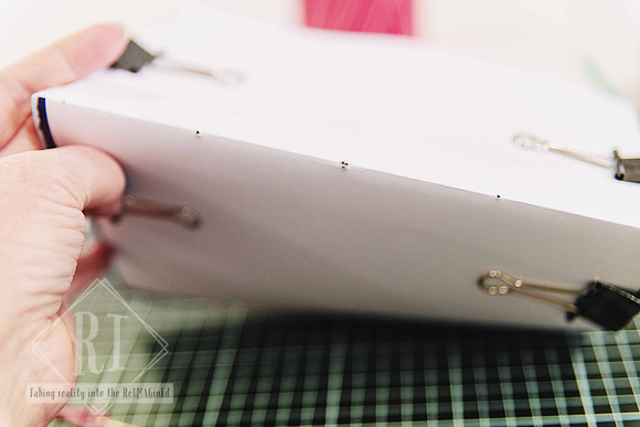 Close-up of simple journal binding techniques for beginners.
