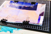 Pages clipped together while constructing a handmade journal.