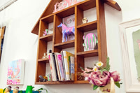 Shelves filled with papers and creative supplies at The Papery.