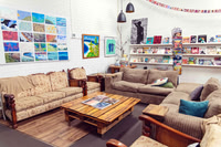 Comfortable seating area inside The Papery creative studio.