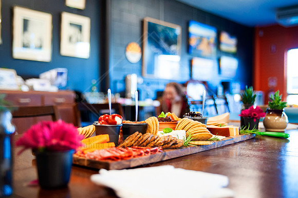 Plated catering and grazing board at local gallery café, styled content photography for hospitality business marketing.